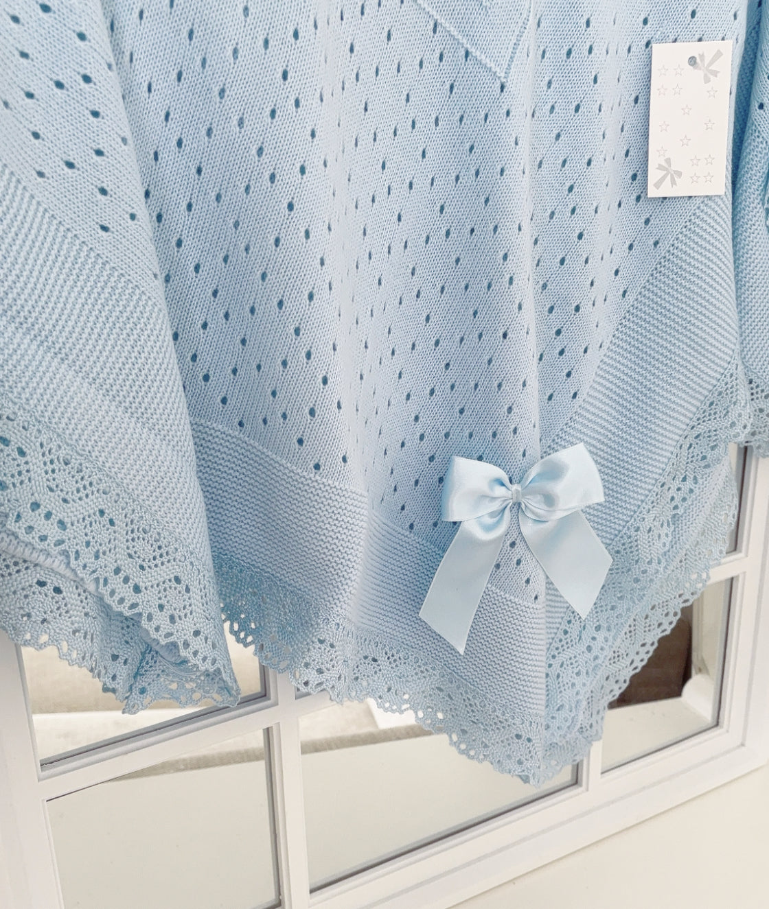 Crochet lace and ribbon shawl