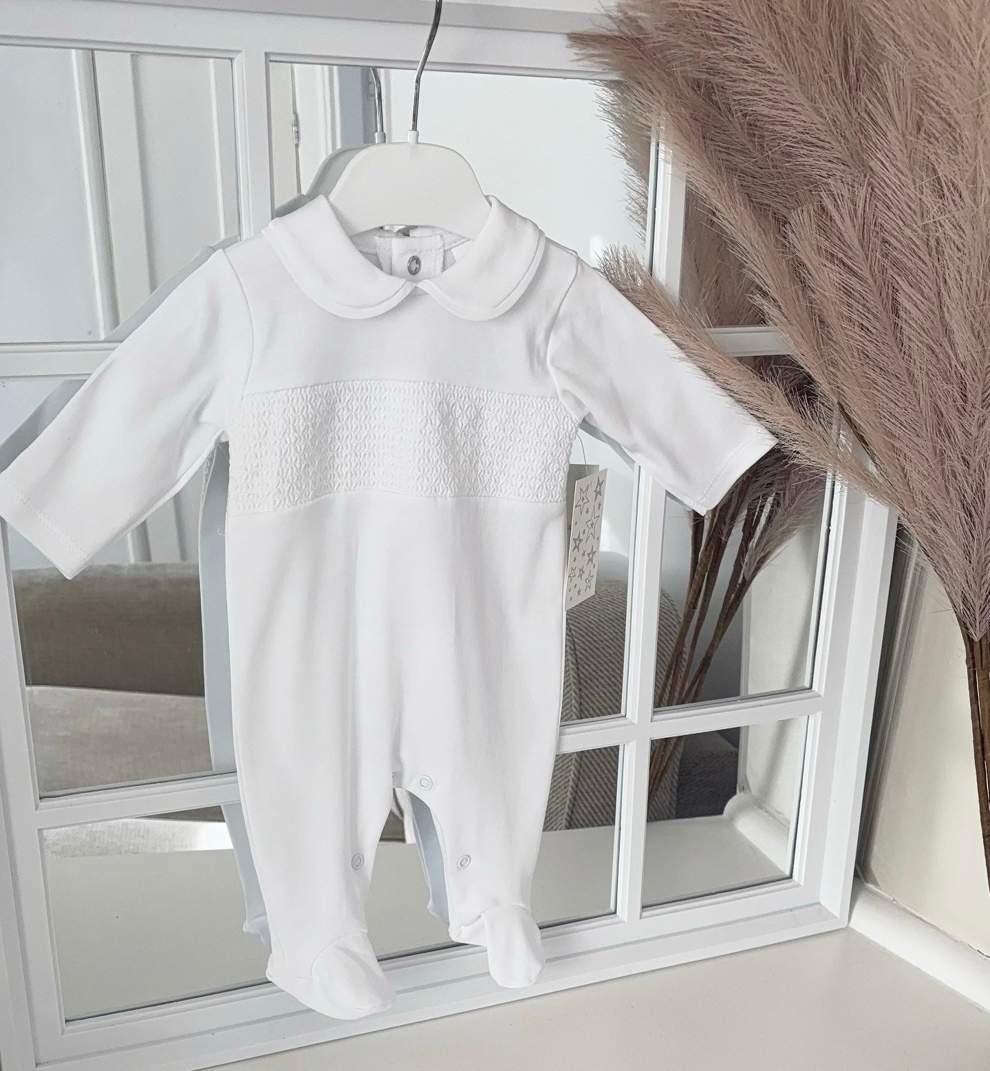 Unisex white smocked all in one