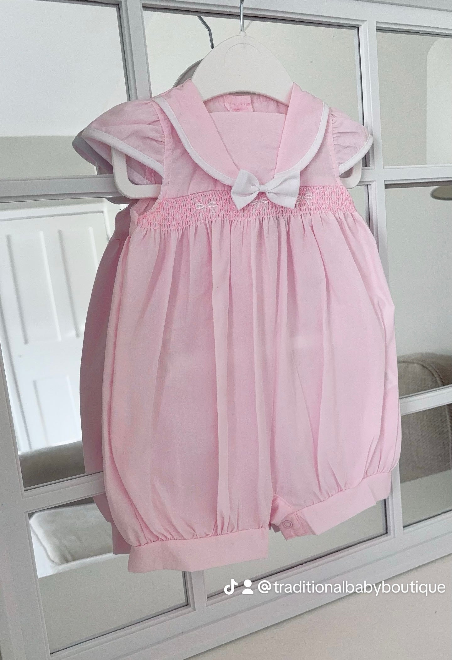Baby girls smocked “Bow” romper