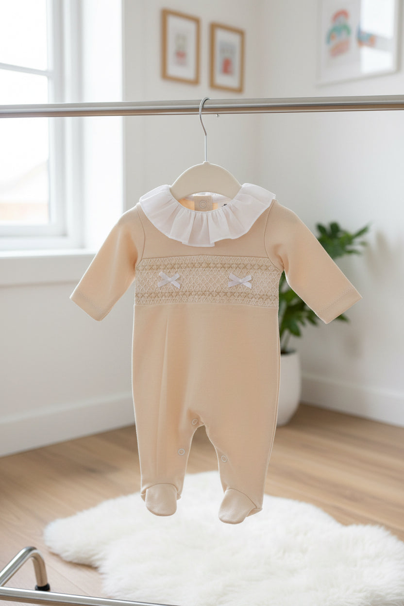 Baby girls smocked all in one with frilled collar