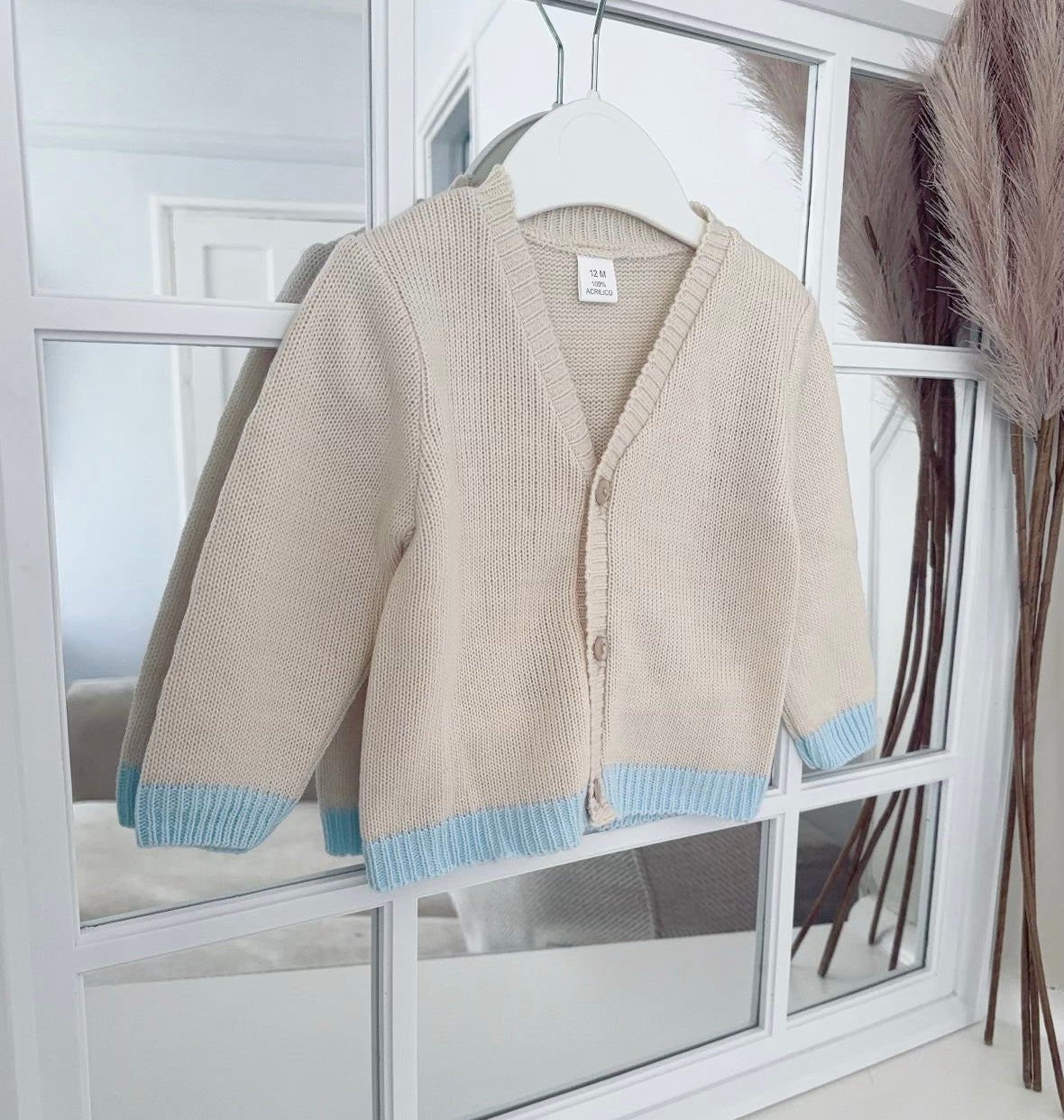 Baby boys knitted romper and cardigan set