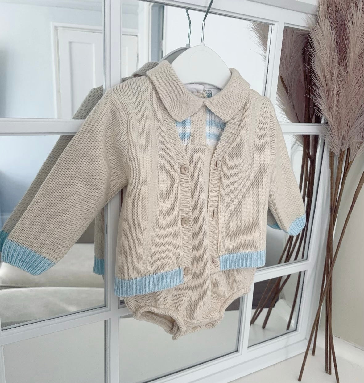 Baby boys knitted romper and cardigan set