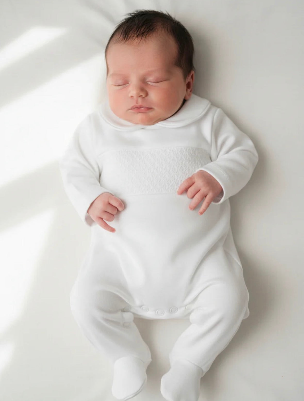 White Unisex smocked all in one