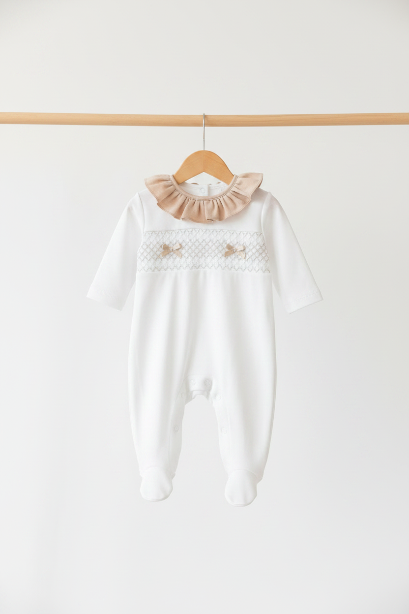 Baby girls smocked all in one with frilled collar